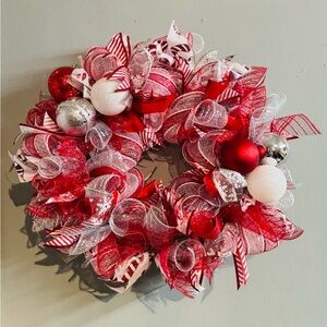 Red and White Holiday Wreath with Ornaments and Candy Cane Stripes